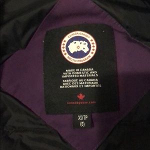 Purple Canada goose coat with hood. Size XS(6)